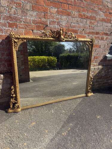 A Highly Impressive Large Antique English 19th Century gilt Overmantle Mirror.