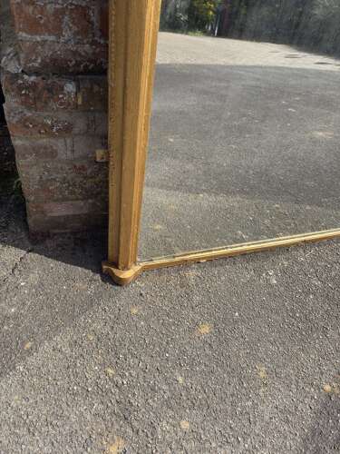 An Exceptional large Antique English 19th Century arched top gilt Overmantel Mirror.