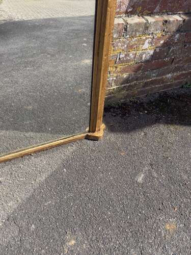 An Exceptional large Antique English 19th Century arched top gilt Overmantel Mirror.