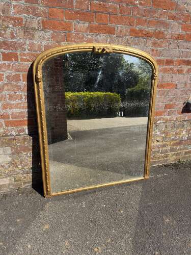 A Wonderful large Antique English 19th Century arched gilt Overmantel Mirror.
