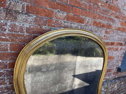 A Specatular large Antique English 19th Century hour glass framed gilt Overmantle Mirror.