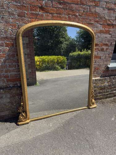 A Stunning large Antique English 19th Century arched top gilt Overmantle Mirror.