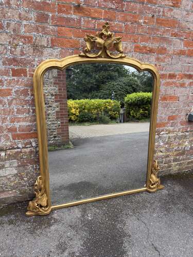 A large Antique English 19th Century shaped top gilt Overmantle Mirror,