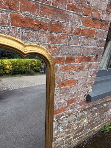 A large Antique English 19th Century shaped top gilt Overmantle Mirror,