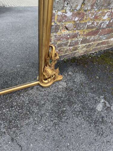 A large Antique English 19th Century shaped top gilt Overmantle Mirror,