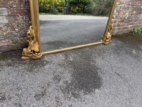 A large Antique English 19th Century shaped top gilt Overmantle Mirror,