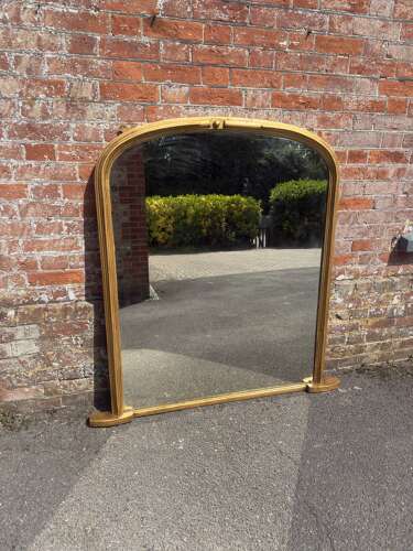 A Wonderful large Antique English 19th Century arched top gilt Overmantle Mirror.