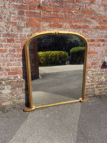 A Wonderful large Antique English 19th Century arched top gilt Overmantle Mirror.