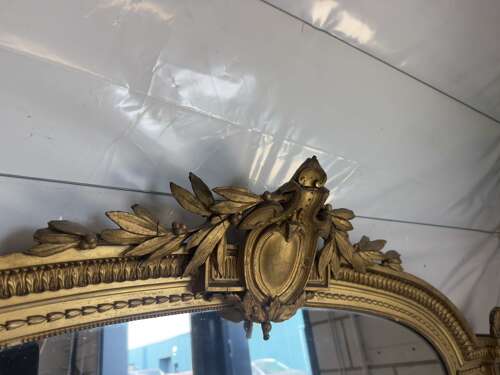 An Exceptional large Antique English 19th C shaped top original gilt Overmantle Mirror.