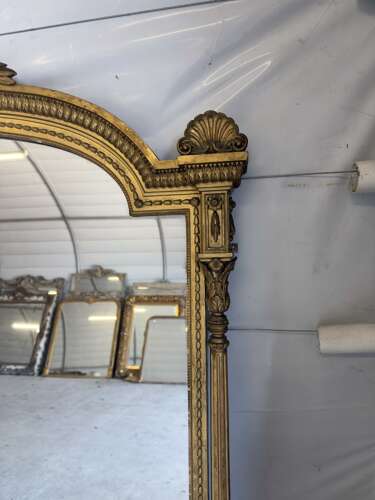 An Exceptional large Antique English 19th C shaped top original gilt Overmantle Mirror.