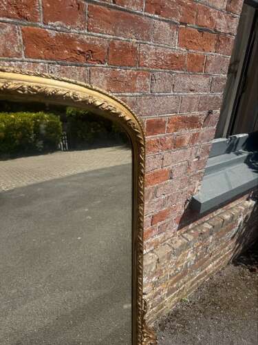 A Fabulous large Antique English 19th C gilt arched top Overmantle Mirror.