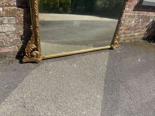 A Fabulous large Antique English 19th C gilt arched top Overmantle Mirror.