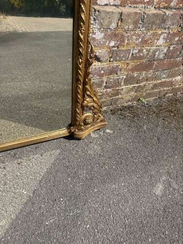 A Fabulous large Antique English 19th C gilt arched top Overmantle Mirror.