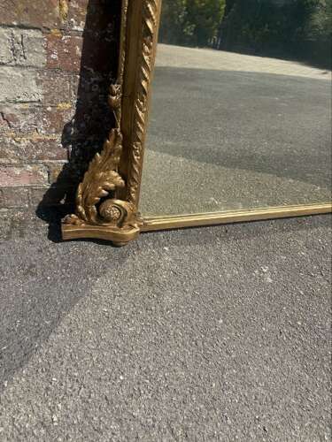 A Fabulous large Antique English 19th C gilt arched top Overmantle Mirror.