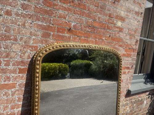 A Superb large Antique English 19th C arched top gilt tulip framed Overmantle Mirror.