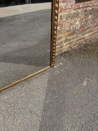 A Superb large Antique English 19th C arched top gilt tulip framed Overmantle Mirror.