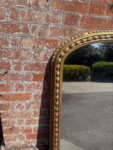 A Superb large Antique English 19th C arched top gilt tulip framed Overmantle Mirror.