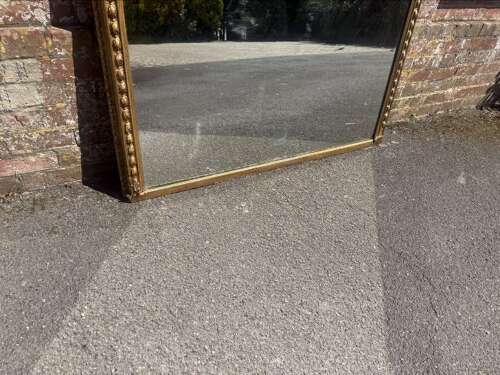A Superb large Antique English 19th C arched top gilt tulip framed Overmantle Mirror.