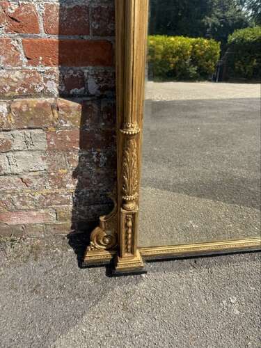 An Impressive large Antique English 19th C gilt column framed Overmantle Mirror.