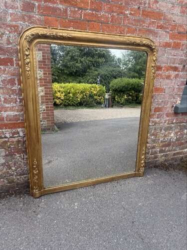 A Fabulous large Early Antique English 19th C arched top gilt Overmantle Mirror.