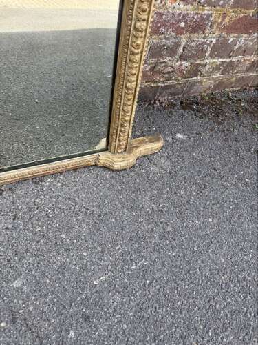 A Delightful large Antique English 19th C arched top gilt Overmantle Mirror.
