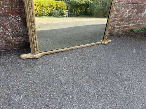 A Delightful large Antique English 19th C arched top gilt Overmantle Mirror.
