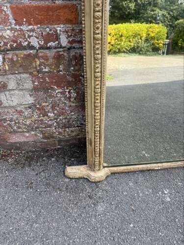 A Delightful large Antique English 19th C arched top gilt Overmantle Mirror.