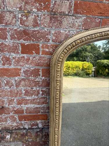 A Delightful large Antique English 19th C arched top gilt Overmantle Mirror.