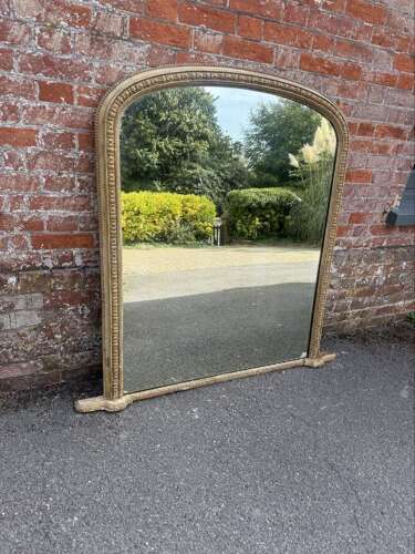 A Delightful large Antique English 19th C arched top gilt Overmantle Mirror.