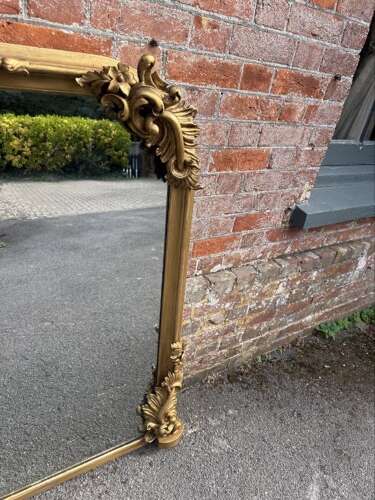 A Spectacular large Antique English 19th C shaped top gilt Overmantle Mirror.