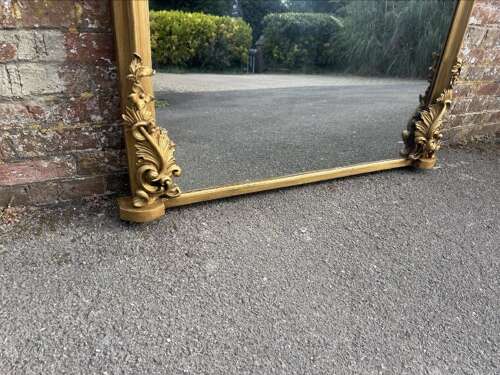 A Spectacular large Antique English 19th C shaped top gilt Overmantle Mirror.