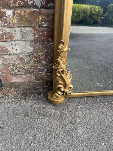 A Spectacular large Antique English 19th C shaped top gilt Overmantle Mirror.