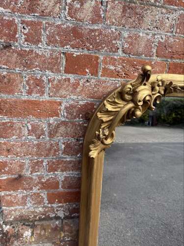 A Spectacular large Antique English 19th C shaped top gilt Overmantle Mirror.