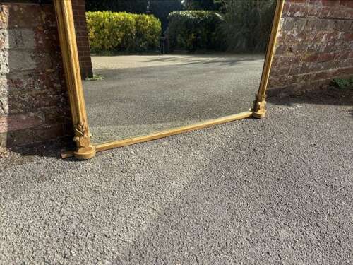 A Delightful large Antique English 19th Century arched top gilt Overmantle Mirror.