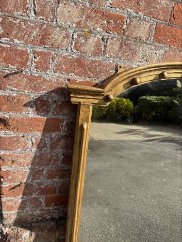 A Delightful large Antique English 19th Century arched top gilt Overmantle Mirror.