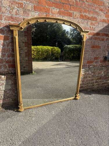 A Delightful large Antique English 19th Century arched top gilt Overmantle Mirror.